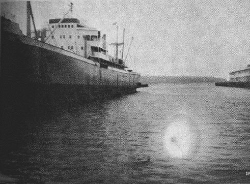 Project Blue Book team almost got its wish for swimming UFO's when this photo turned up. Taken by Jerry Ross    (I'm not a believer in flying saucers. he stressed) in Seattle in January, 1966, photo baffled all the    experts. Project Blue Book - USAF Photo